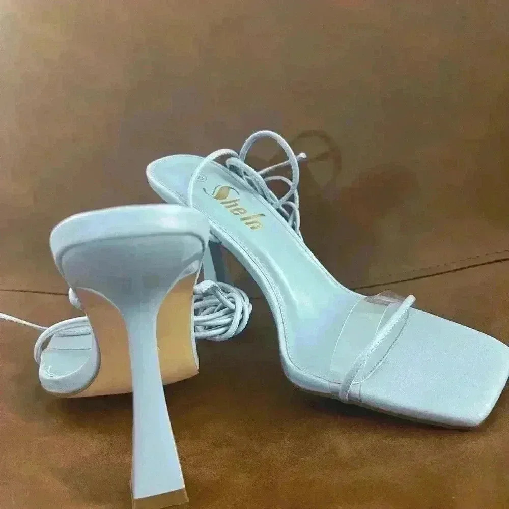 SHEIN baby blue high heel sandals.